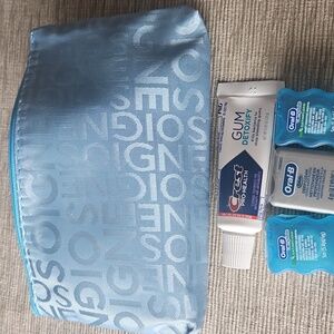 Crest Pro-Health Gum Detoxify Tooth Paste & Oral-B Floss & Blue Pouch.